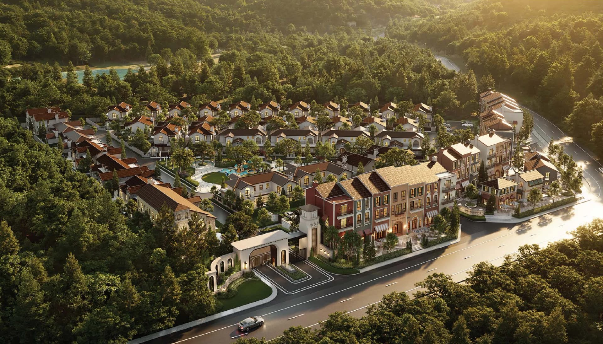 The estate from above: villas in rows, the clubhouse, the play park and the gate